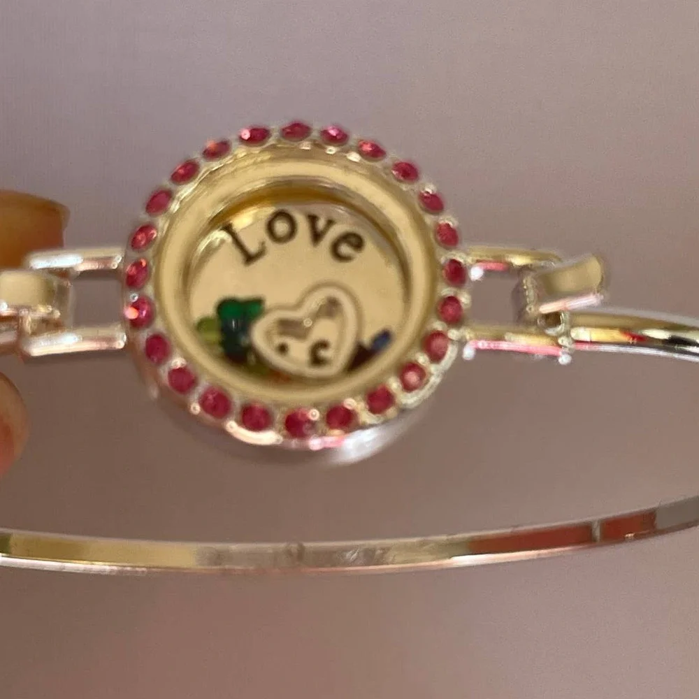 Bangle bracelet silver tone, pink rhinestones‎